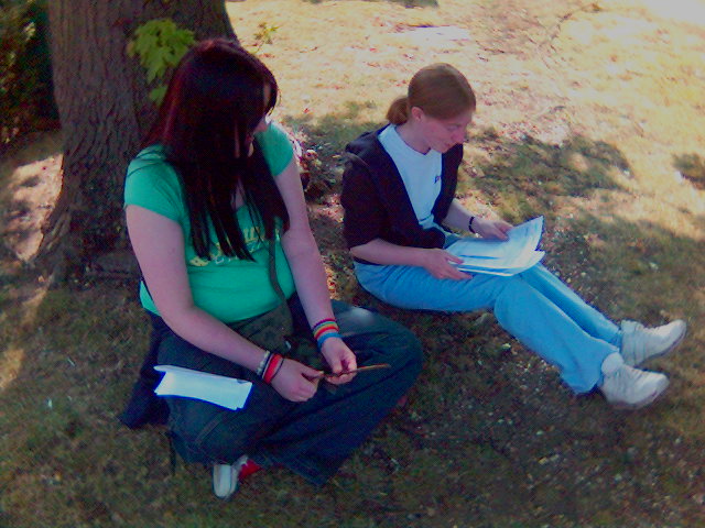 Caz & Hannah sit in trees shade